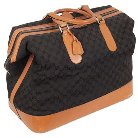 gucci travel bag with wheels|Gucci travel bag vintage.